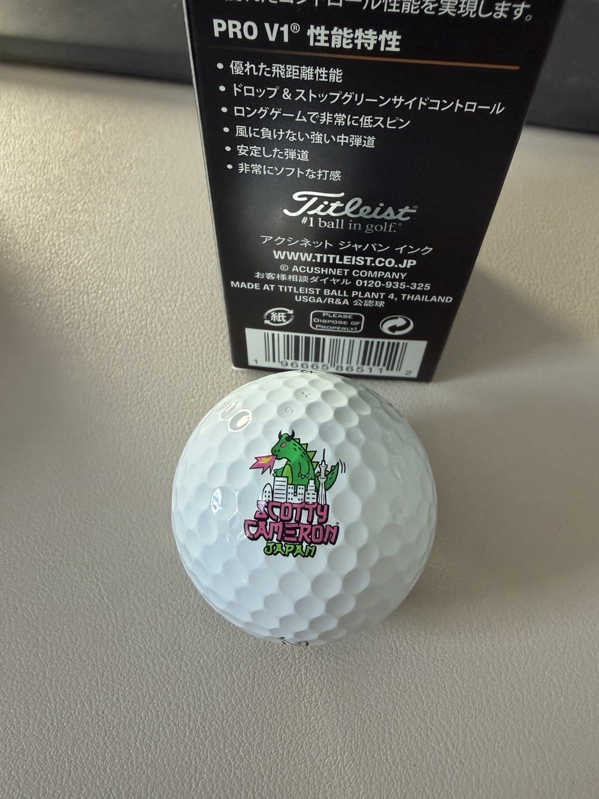 Scotty Cameron Godzilla (Dogzilla) Pro V1 Logo Ball — Pink/Green